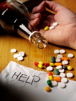 bottle of pills with a help note
